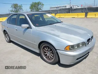 2001 BMW 5 Series 530iA with VIN WBADT63411CF01165, listed as a IAAI auction lot 42101589 with 151,243 mi miles. Bid and sale history available at carsss.com. Image 1.