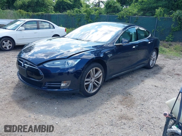 2013 Tesla Model S with VIN 5YJSA1CN0DFP21851, listed as a IAAI auction lot 42557791 with 106,328 mi miles and . Bid and sale history available at DreamBid. Image 21.