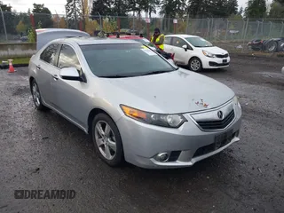 2012 Acura TSX Tech Pkg with VIN JH4CU2F62CC012290, listed as a IAAI auction lot 40765338 with 129,737 mi miles. Bid and sale history available at carsss.com. Image 1.