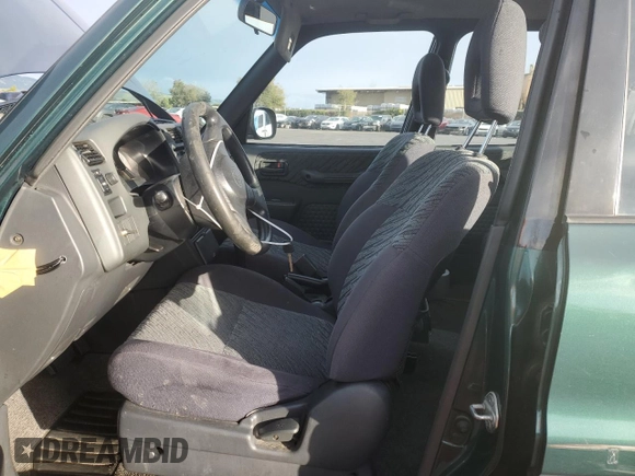 1999 Toyota RAV4 with VIN JT3GP10V5X7060132, listed as a Copart auction lot 48188975 with 226,460 mi miles and Clean Title. Bid and sale history available at DreamBid. Image 7.