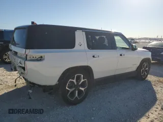 2023 Rivian R1S Adventure with VIN 7PDSGBBA4PN022157, listed as a Copart auction lot 81359984 with 13,522 mi miles and Salvage Title. Bid and sale history available at DreamBid. Image 3.