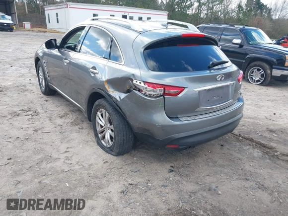 2015 Infiniti QX70 with VIN JN8CS1MWXFM480906, listed as a IAAI auction lot 41177811 with 176,527 mi miles and . Bid and sale history available at DreamBid. Image 3.