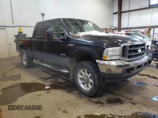2004 Ford F-350 XL with VIN 1FTSW31P74EA91328, listed as a Copart auction lot 85856984 with 291,033 mi miles and Salvage Title. Bid and sale history available at DreamBid. Image 4.