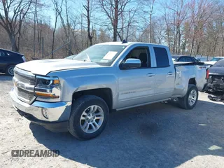 2018 Chevrolet Silverado 1500 LT with VIN 1GCVKREH4JZ323242, listed as a IAAI auction lot 41971945 with 63,915 mi miles and . Bid and sale history available at DreamBid. Image 6.