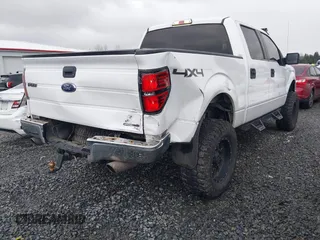 2014 Ford F-150 XL with VIN 1FTFW1EF1EKF65204, listed as a IAAI auction lot 41669195 with 84,882 mi miles. Bid and sale history available at carsss.com. Image 4.