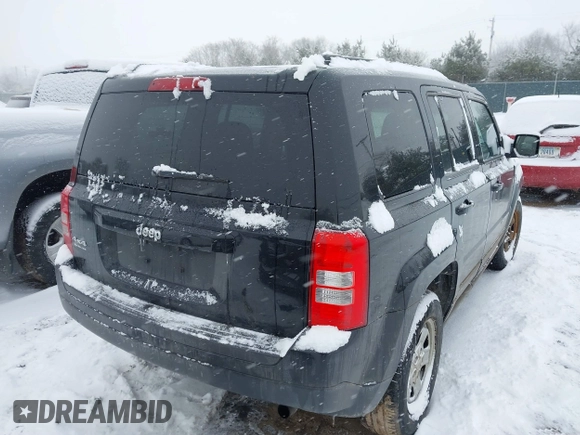 2014 Jeep Patriot Sport with VIN 1C4NJRBB2ED841808, listed as a IAAI auction lot 41595178 with 146,323 mi miles and . Bid and sale history available at DreamBid. Image 4.