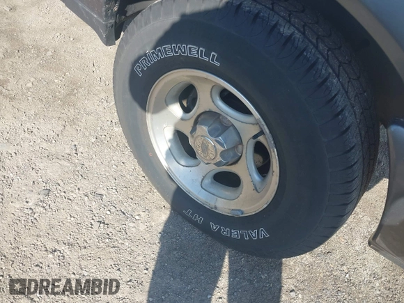 2004 Ford Ranger XL Fleet with VIN 1FTYR44U64PA69320, listed as a IAAI auction lot 42241449 with 202,895 mi miles and . Bid and sale history available at DreamBid. Image 12.