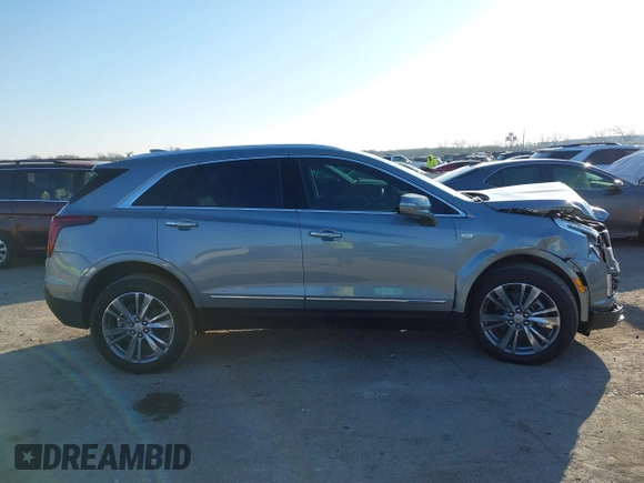 2025 Cadillac XT5 FWD Premium Luxury with VIN 1GYKNCRS7SZ104526, listed as a IAAI auction lot 41468623 with 3,896 mi miles. Bid and sale history available at carsss.com. Image 13.