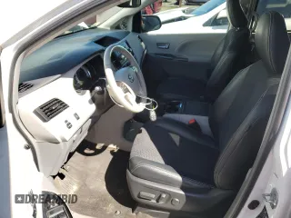 2014 Toyota Sienna SE with VIN 5TDXK3DCXES498422, listed as a Copart auction lot 51060775 with 131,541 mi miles and Clean Title. Bid and sale history available at DreamBid. Image 7.