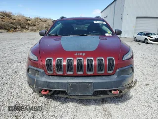 2014 Jeep Cherokee Trailhawk with VIN 1C4PJMBS7EW157305, listed as a Copart auction lot 49436685 with 138,446 mi miles and Salvage Title. Bid and sale history available at carsss.com. Image 5.