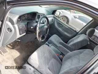 2004 Honda Odyssey EX-RES z VIN 5FNRL18824B138287, wystawiony jako IAAI lot #42245444 z przebiegiem 196 932 mil mil oraz . Historia ofert i sprzedaży dostępna na DreamBid. Obrazek 15.