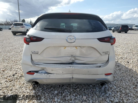 2024 Mazda CX-5 2.5 Turbo Signature with VIN JM3KFBXY7R0518304, listed as a Copart auction lot 42788985 with 8,593 mi miles and Salvage Title. Bid and sale history available at carsss.com. Image 6.