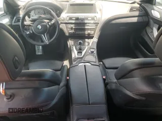 2014 BMW M6 with VIN WBS6C9C55ED467226, listed as a Copart auction lot 61779015 with Not provided miles and Salvage title. Bid and sale history available at DreamBid. Image 8.