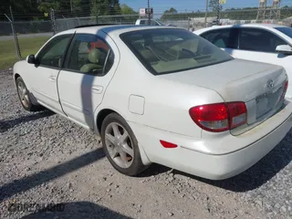 2002 Infiniti I35 Luxury with VIN JNKDA31AX2T020070, listed as a IAAI auction lot 42030518 with 165,414 mi miles. Bid and sale history available at carsss.com. Image 3.