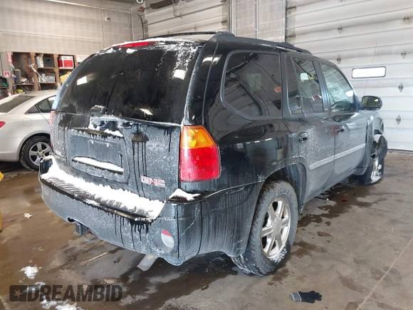 2007 GMC Envoy SLE with VIN 1GKDT13S472123167, listed as a IAAI auction lot 41385620 with 157,680 mi miles. Bid and sale history available at carsss.com. Image 4.