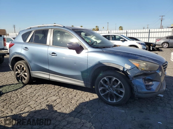 2016 Mazda CX-5 Grand Touring with VIN JM3KE2DY8G0644790, listed as a Copart auction lot 82060424 with 0 mi miles and Clean Title. Bid and sale history available at carsss.com. Image 4.