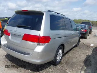 2008 Honda Odyssey EX-L with VIN 5FNRL38668B102716, listed as a IAAI auction lot 41908212 with 221,253 mi miles. Bid and sale history available at carsss.com. Image 4.