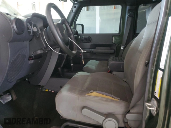 2007 Jeep Wrangler Unlimited Sahara с VIN 1J4GA59167L107870, выставлен на аукционе Copart как лот 58346115 с пробегом 180 107 миль миль и Чистый • Clean title. История ставок и продаж доступна на DreamBid. Изображение 7.