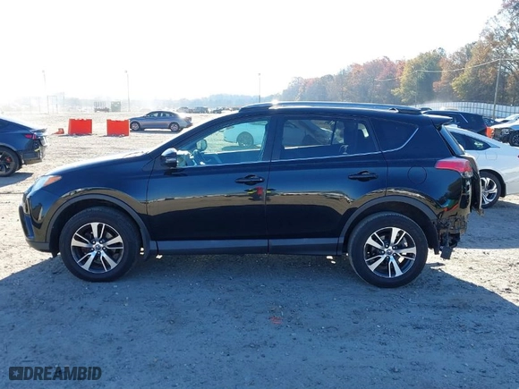 2018 Toyota RAV4 XLE with VIN 2T3RFREV9JW793956, listed as a IAAI auction lot 41012152 with 77,033 mi miles. Bid and sale history available at carsss.com. Image 15.