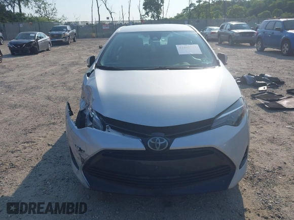 2018 Toyota Corolla L with VIN 2T1BURHE6JC100175, listed as a IAAI auction lot 42405737 with 123,183 mi miles and . Bid and sale history available at DreamBid. Image 12.