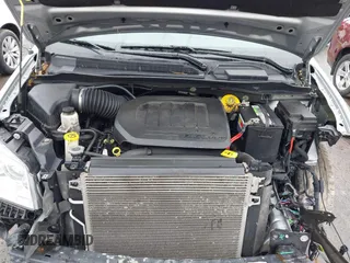 2019 Dodge Grand Caravan SXT with VIN 2C4RDGCG1KR580039, listed as a IAAI auction lot 41997472 with 163,915 mi miles and . Bid and sale history available at DreamBid. Image 10.