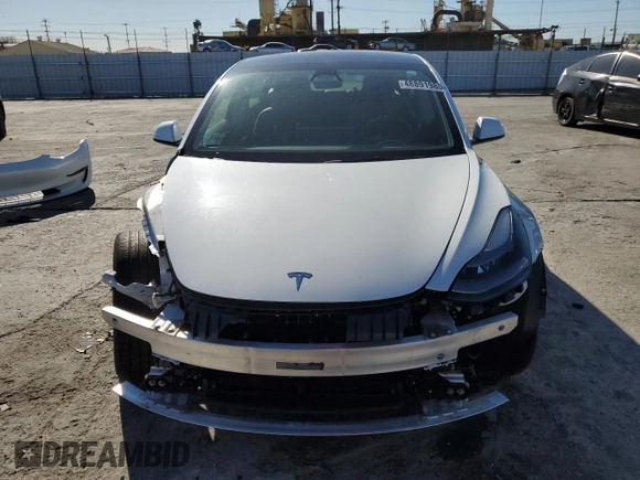 2023 Tesla Model 3 with VIN 5YJ3E1EA7PF557358, listed as a Copart auction lot 48891985 with 20,673 mi miles and Salvage title. Bid and sale history available at DreamBid. Image 5.
