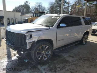 2020 Chevrolet Suburban Premier with VIN 1GNSKJKC0LR276184, listed as a Copart auction lot 88840565 with 87,563 mi miles and Salvage Title. Bid and sale history available at carsss.com. Image 1.