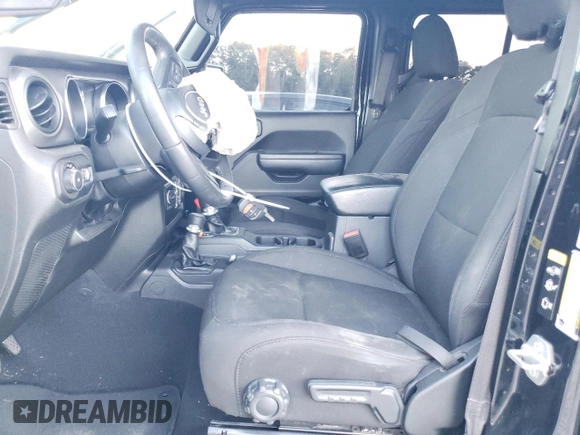 2022 Jeep Wrangler Unlimited High Tide with VIN 1C4HJXDG1NW134486, listed as a Copart auction lot 75280764 with 61,282 mi miles and Salvage Title. Bid and sale history available at DreamBid. Image 7.