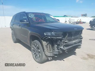 2023 Jeep Grand Cherokee Overland with VIN 1C4RJKDG5P8771928, listed as a IAAI auction lot 42602996 with 32,691 mi miles and . Bid and sale history available at DreamBid. Image 1.