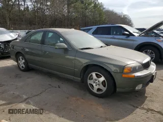 2000 Lincoln LS with VIN 1LNHM86S5YY852576, listed as a Copart auction lot 43073515 with 131,207 mi miles and Salvage Title. Bid and sale history available at carsss.com. Image 4.