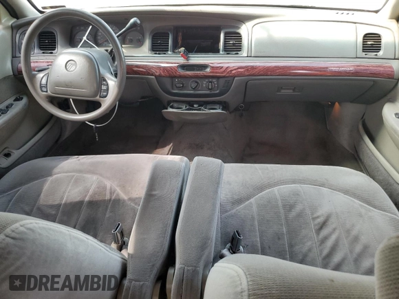 2000 Mercury Grand Marquis GS z VIN 2MEFM74WXYX699560, wystawiony jako Copart lot #57721925 z przebiegiem 246 297 mil mil oraz Szkoda całkowita • Salvage title. Historia ofert i sprzedaży dostępna na DreamBid. Obrazek 8.