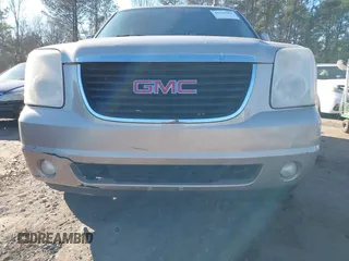 2007 GMC Yukon SLT with VIN 1GKFK13067J382064, listed as a IAAI auction lot 41371965 with 260,205 mi miles. Bid and sale history available at carsss.com. Image 6.