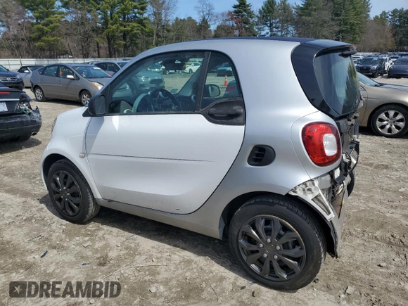 2016 Smart fortwo Passion z VIN WMEFJ5DAXGK123943, wystawiony jako Copart lot #51904865 z przebiegiem 69 821 mil mil oraz Szkody całkowita. Historia ofert i sprzedaży dostępna na DreamBid. Obrazek 2.