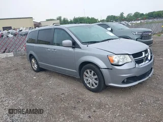 2018 Dodge Grand Caravan SXT z VIN 2C4RDGCG7JR301434, wystawiony jako IAAI lot #42510771 z przebiegiem 270 524 mil mil oraz . Historia ofert i sprzedaży dostępna na DreamBid. Obrazek 1.
