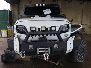 2012 Jeep Wrangler Unlimited Sport с VIN 1C4BJWDG8CL183831, выставлен на аукционе IAAI как лот 42343612 с пробегом 166 847 миль миль и . История ставок и продаж доступна на DreamBid. Изображение 13.