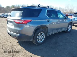 2021 Chevrolet Traverse LT Cloth with VIN 1GNEVGKW2MJ146411, listed as a IAAI auction lot 41694651 with 57,673 mi miles. Bid and sale history available at carsss.com. Image 4.