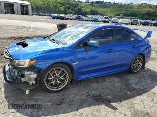 2015 Subaru WRX STI Limited z VIN JF1VA2U62F9802377, wystawiony jako Copart lot #57689134 z przebiegiem 92 690 mil mil oraz Szkody całkowita. Historia ofert i sprzedaży dostępna na DreamBid. Obrazek 1.