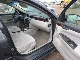 2014 Chevrolet Impala LS with VIN 2G1WA5E38E1110029, listed as a IAAI auction lot 42609288 with 213,861 mi miles and . Bid and sale history available at DreamBid. Image 5.