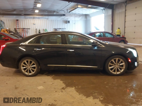 2014 Cadillac XTS Luxury with VIN 2G61M5S39E9325923, listed as a IAAI auction lot 41253343 with 69,319 mi miles. Bid and sale history available at carsss.com. Image 13.