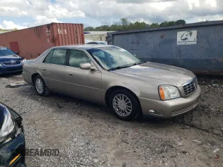 2004 Cadillac DeVille DHS z VIN 1G6KE57Y74U116879, wystawiony jako Copart lot #71017214 z przebiegiem 130 169 mil mil oraz Szkoda całkowita • Salvage title. Historia ofert i sprzedaży dostępna na DreamBid. Obrazek 4.