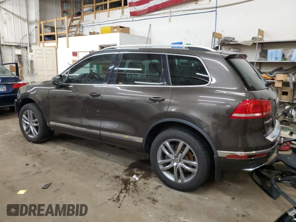 2016 Volkswagen Touareg Sport z VIN WVGEP9BPXGD006774, wystawiony jako Copart lot #56045495 z przebiegiem 85 695 mil mil oraz Szkoda całkowita • Salvage title. Historia ofert i sprzedaży dostępna na DreamBid. Obrazek 2.