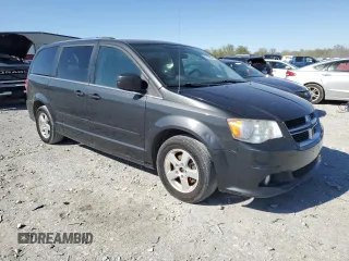 2011 Dodge Grand Caravan Crew with VIN 2D4RN5DG7BR650047, listed as a Copart auction lot 52929885 with 235,858 mi miles and Clean Title. Bid and sale history available at DreamBid. Image 4.