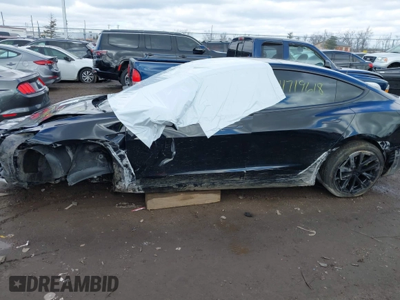 2023 Tesla Model 3 z VIN 5YJ3E1EA1PF512562, wystawiony jako IAAI lot #41719618 z przebiegiem 43 612 mil mil oraz . Historia ofert i sprzedaży dostępna na DreamBid. Obrazek 15.