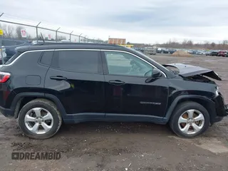 2018 Jeep Compass Altitude with VIN 3C4NJDBB2JT108035, listed as a IAAI auction lot 42013400 with 179,886 mi miles and . Bid and sale history available at carsss.com. Image 13.