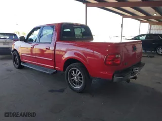 2001 Ford F-150 SuperCrew XLT with VIN 1FTRW07W61KB16745, listed as a IAAI auction lot 42001221 with 260,200 mi miles. Bid and sale history available at carsss.com. Image 3.