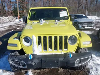 2023 Jeep Wrangler 4xe Sahara with VIN 1C4JJXP66PW580527, listed as a IAAI auction lot 41261127 with 15,100 mi miles. Bid and sale history available at carsss.com. Image 12.