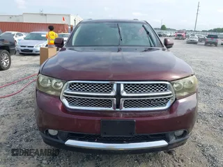 2012 Dodge Durango Crew z VIN 1C4RDHDG1CC144421, wystawiony jako IAAI lot #42232137 z przebiegiem 215 051 mil mil oraz . Historia ofert i sprzedaży dostępna na DreamBid. Obrazek 6.