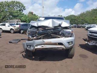 2014 Toyota Tacoma with VIN 3TMLU4EN3EM159080, listed as a IAAI auction lot 41809259 with 113,950 mi miles and . Bid and sale history available at DreamBid. Image 12.