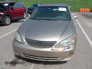 2003 Toyota Camry LE with VIN 4T1BE32K13U243738, listed as a IAAI auction lot 42120647 with Not Provided miles and . Bid and sale history available at DreamBid. Image 6.