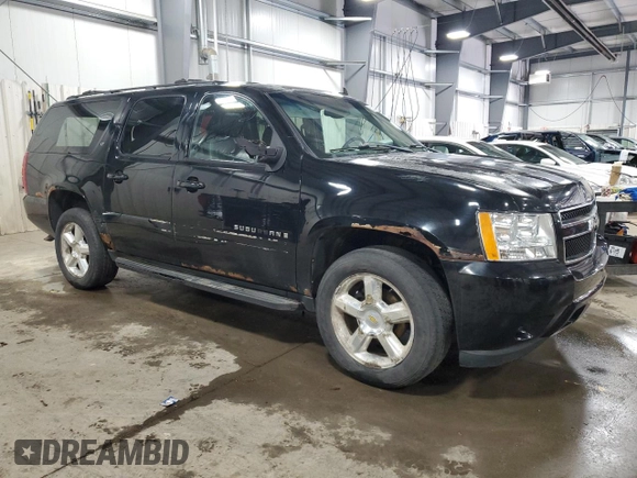 2009 Chevrolet Suburban LT w/2LT with VIN 1GNFK26319J124911, listed as a Copart auction lot 53263455 with 215,826 mi miles and Salvage Title. Bid and sale history available at carsss.com. Image 4.